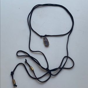 Brown leather/ string choker with purple stone